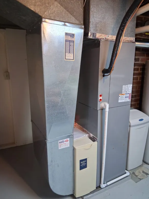 The interior part of the Schneider's ASHP system in their basement.