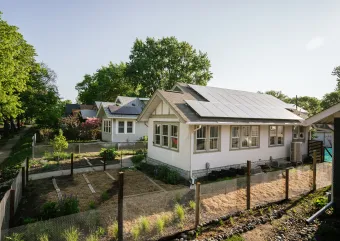 A home with solar panels installed on the roof.