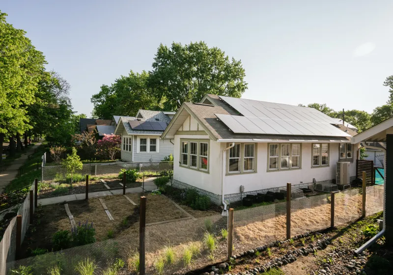 A home with solar panels installed on the roof.