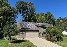 The Silbert family home has solar panels on the roof.